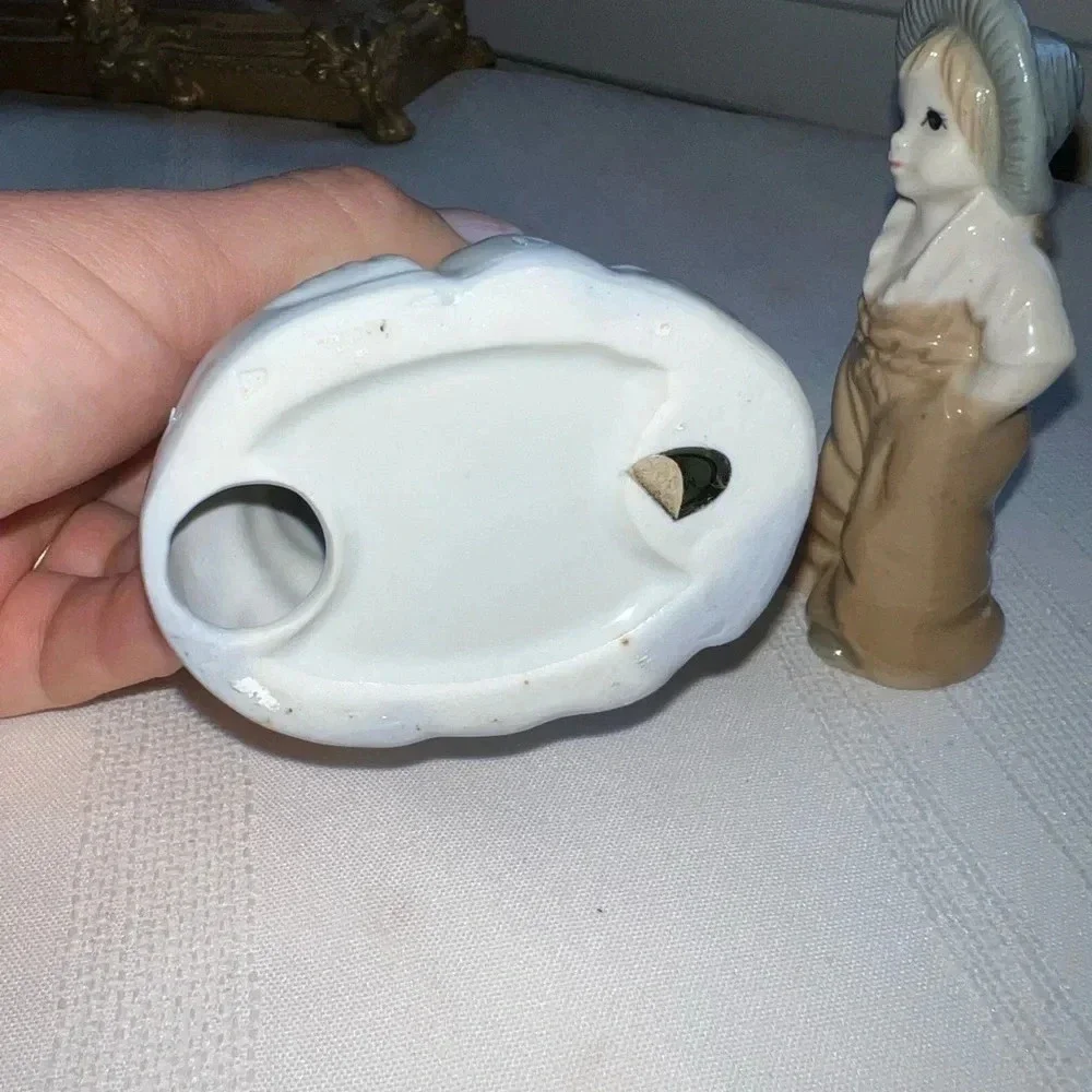Vintage Porcelain Figurines Woman In Dress With Duck Boy Hands In Pockets